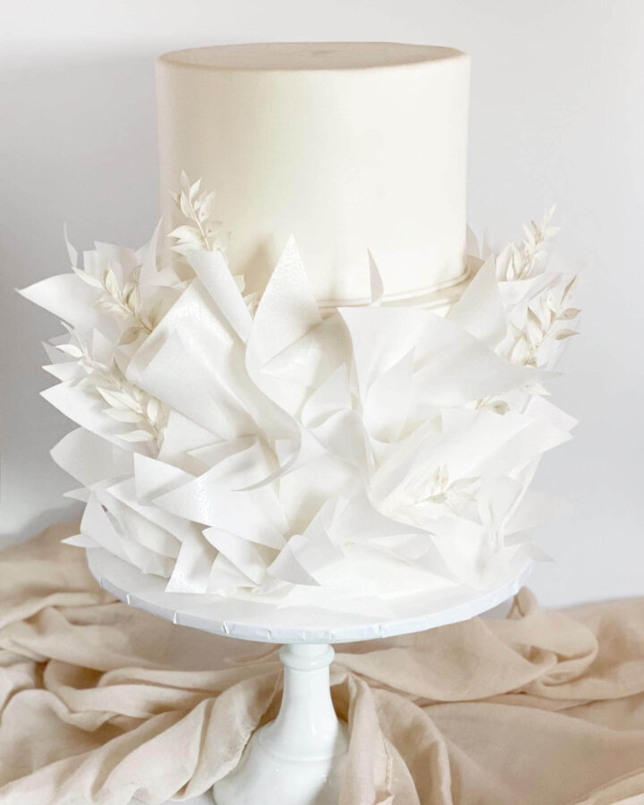 White wedding cake with wafer paper ruffles
